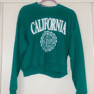Crew neck varsity sweater , very warm .